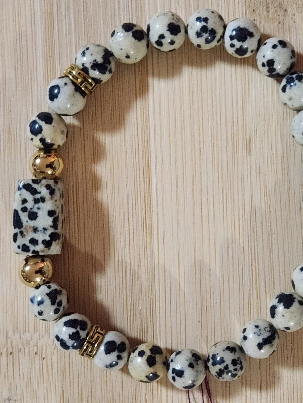 Hand Crafted Dalmatian Jasper Stretch Bracelet With Gold Accents Black Beige